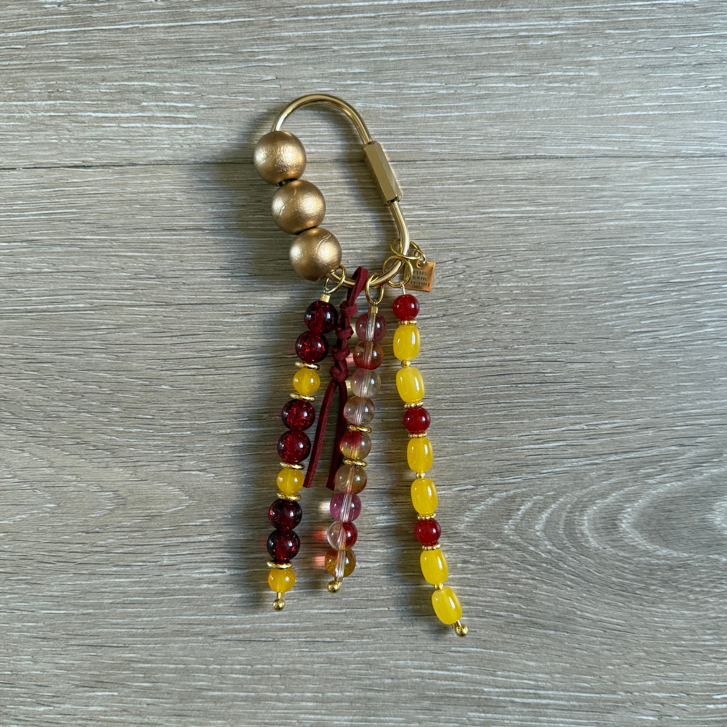 Carry Charm | Crimson + Marigold